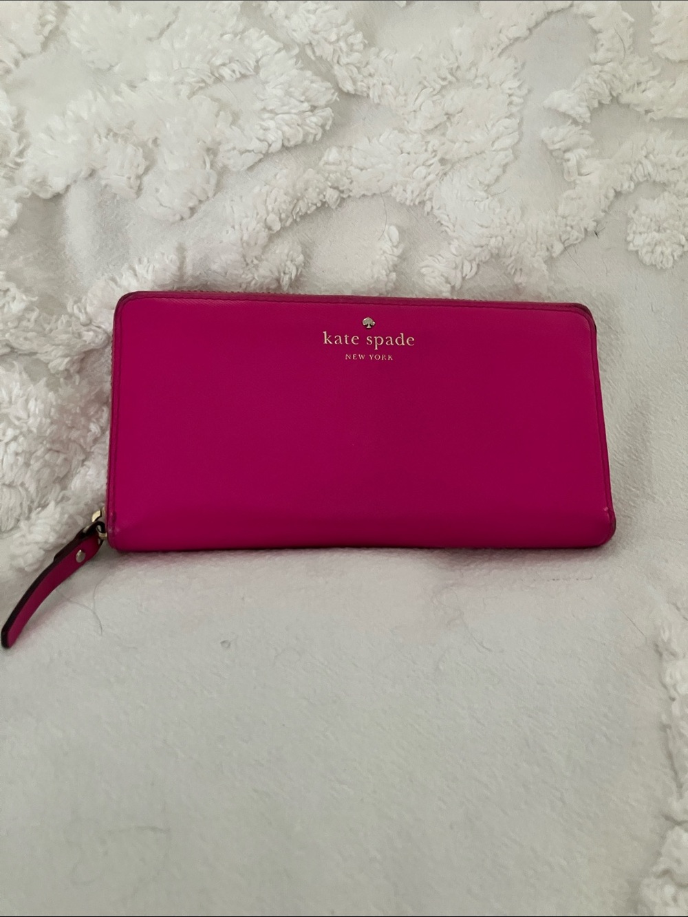 kate spade vibrant fuchsia zip-around wallet with gold logo